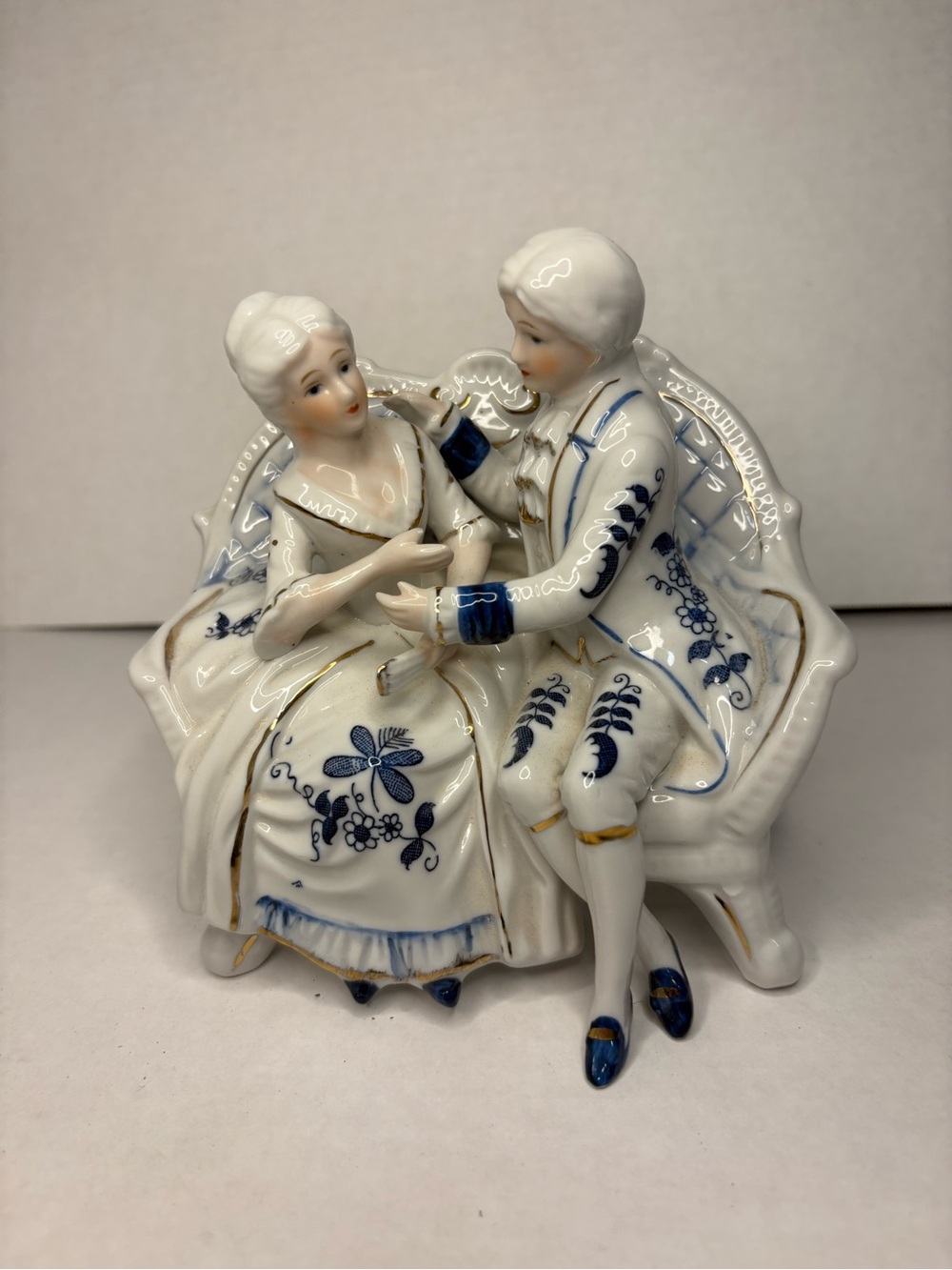 Vintage Porcelain Victorian figures having a conversation made in Japan